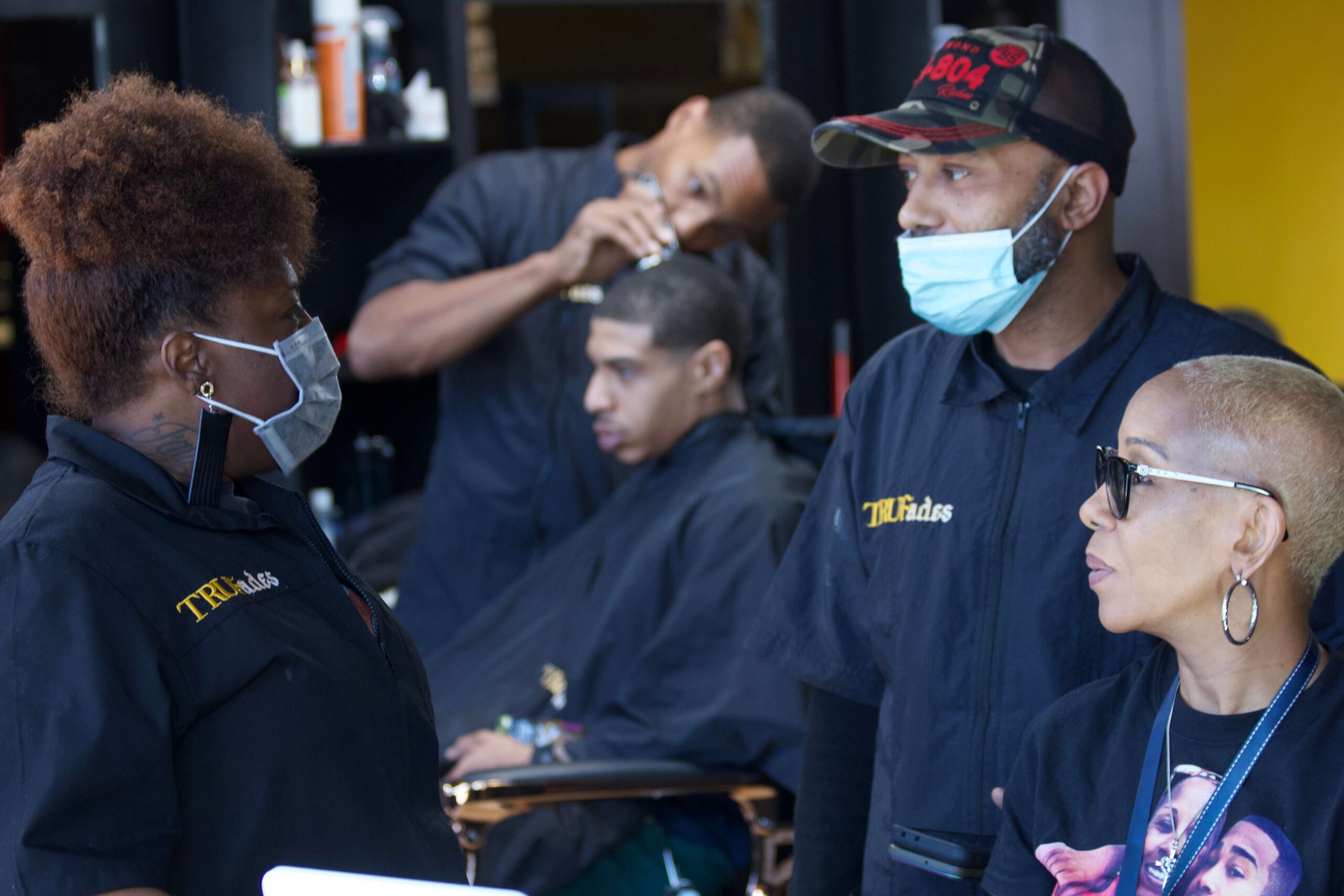 Staff at TruFades Barbershop in Richmond, VA